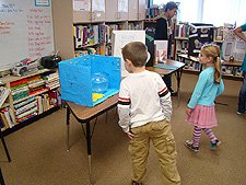 Hunter looking at the science exhibits.