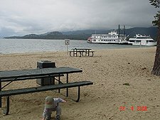 Hunter picking up rocks.