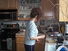 Heidi getting dinner ready.