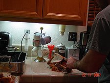 Dave carves the turkey.