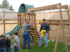 Ken and Pat getting the pin&atilde;ta ready.